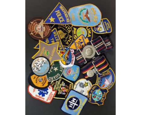 QUANTITY OF VINTAGE POLICE PATCHES AND 2 BRITISH ARMY STABLE BELTS