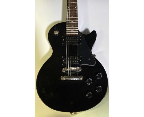 A 2015 issued Epiphone Les Paul Studio electric guitar, serial 15071511064. Some scuffs and light marks to body.
