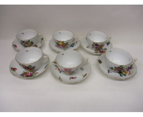 A set of six Herend porcelain breakfast teacups, 4" dia and saucers 6" dia, decorated with fruit, vegetables and nuts, with a