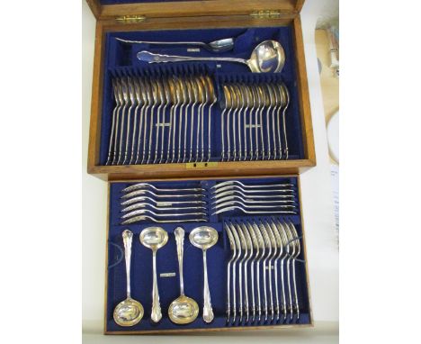 A George V silver Chippendale pattern canteen by William Hutton & Sons Ltd, London 1912, comprising of twelve dessert spoons,