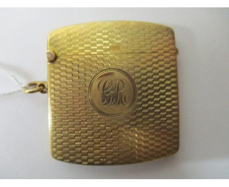 A 9ct gold vesta case of cushioned form with engine turned decoration, initialled, 27g total 