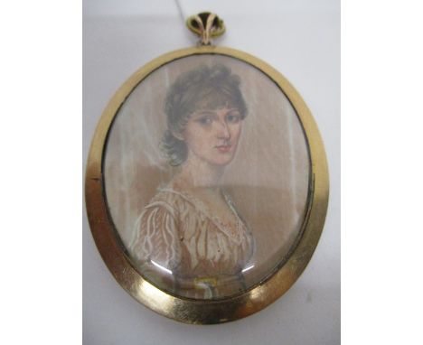Attributed to Frederick Buck - a portrait miniature of a girl in a white dress with a glazed aperture and blue enamelled bord