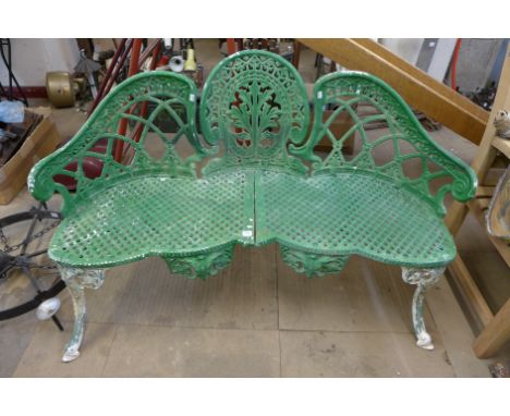 A cast alloy garden bench