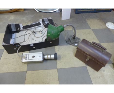 An industrial anglepoise lamp, vintage Panasonic TV camera and a brown leather case