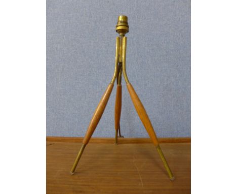 A 1950's teak tripod lamp base