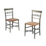A PAIR OF PAINTED AND PARCEL GILT SIDE CHAIRS