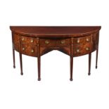A GEORGE III MAHOGANY AND MARQUETRY INLAID SIDEBOARD
