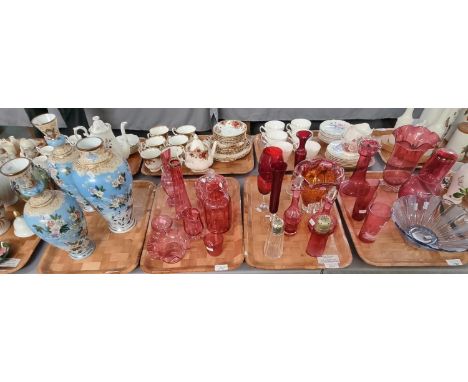 Four trays of glassware to include mainly cranberry glass: jugs, specimen and other vases, cranberry beaker, ruby glass, Mura