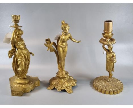Gilded yellow metal figural candlestick together with a gilt metal figural candlestick and an Art Nouveau design, probably sp