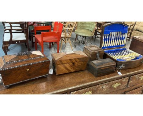Group of assorted boxes and caddies to include: William IV rosewood sarcophagus shaped tea caddy, another Georgian mahogany c