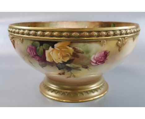 Royal Worcester porcelain pedestal bowl, hand painted with roses and foliage with repeating beaded border.  23cm diameter x 1