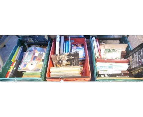 Three crates of assorted books to include: Tolkien 'The Lord of the Rings' appearing to be 10th impression 1972, Mario Puzo '