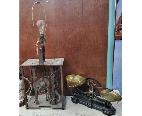 Novelty table lamp in the form of a clock movement with cogs and wheels together with a pair of W &amp; T Avery brass shop/ki