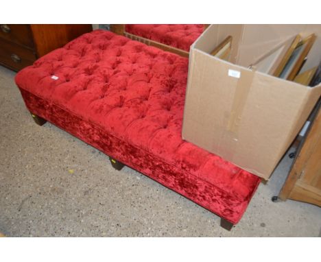 A red velvet button down stool