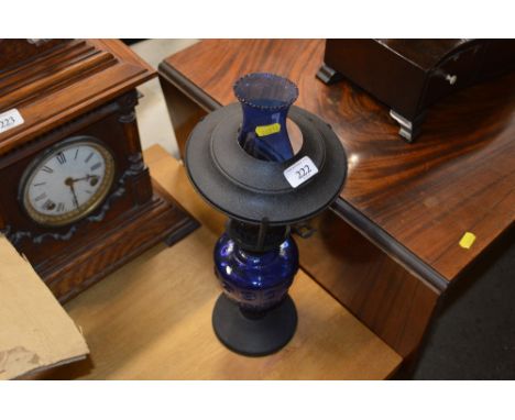 A blue glass oil lamp with original box 