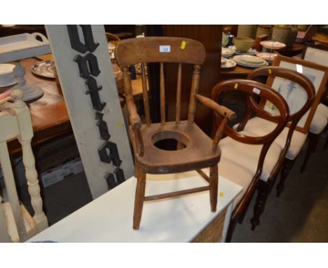 A child's elm seated commode chair 