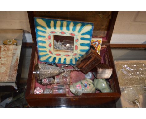 A 19th Century mahogany trinket box and contents to include glass scent bottles, a hard stone frog ornament etc.