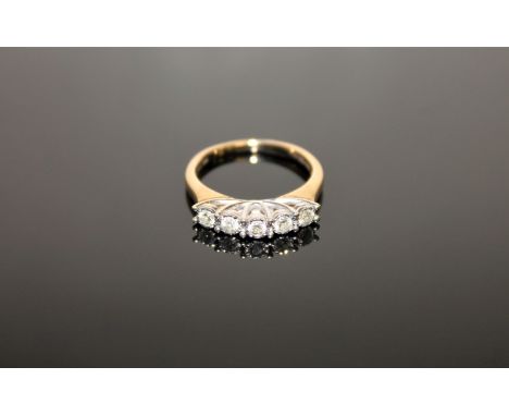 A 9ct gold five stone diamond ring, size K/L