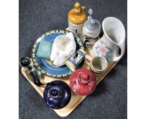 A tray containing a glass figure of a seal, pottery Scotch whisky decanters, beer steins, Royal Winton lustre jug etc