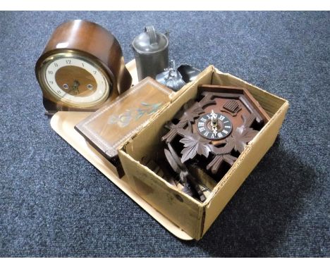 A tray containing Black Forest style cuckoo clock, wooden trinket box, Smiths mantel clock, plated sugar helmet, antique key