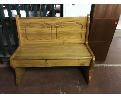 A pine storage bench