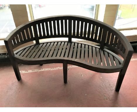 A plantation teak garden bench