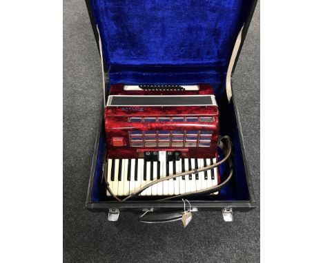 A cased Baile accordion 