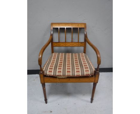 A continental inlaid mahogany scroll armed armchair, with a tapestry upholstered seat 