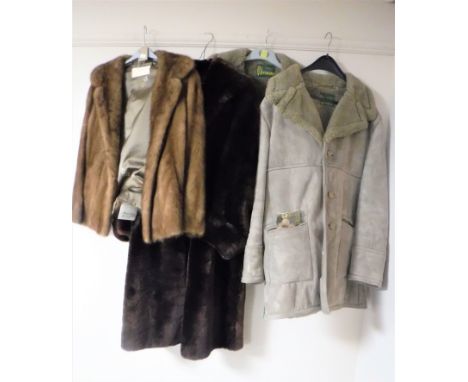 A vintage mink fur coat by Morris Melody of Sunderland together with a simulated fur 3/4 length coat, a mink brooch and two s