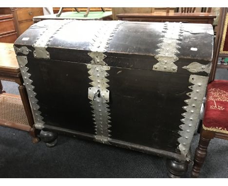 A nineteenth century oak metal bound shipping trunk 