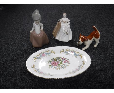 A Beswick figure of a terrier together with a Nao figure of a girl, a Coalport figurine and a Paragon china oval dish