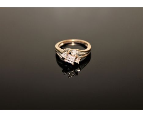 A 9ct gold diamond set ring, size M