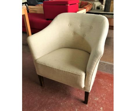 A mid twentieth century button upholstered armchair 