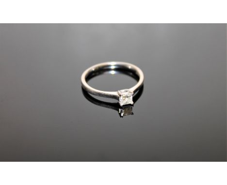 An 18ct white gold diamond solitaire ring, approximately 0.3ct, size O, originally purchased from the Northern Goldsmiths for