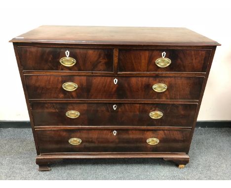 A George III mahogany five drawer chest on bracket feet, width 113cm 
