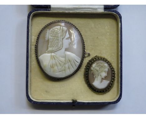 TWO VINTAGE OVAL CAMEO BROOCHES 
