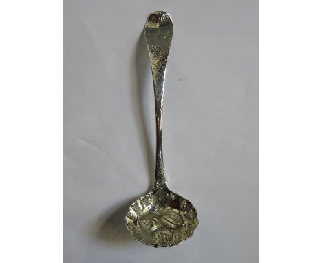 EARLY HALLMARKED SILVER TEA STRAINING LADLE WITH REPOUSSE FRUIT AND VINE DECORATION, MARKS WORN 