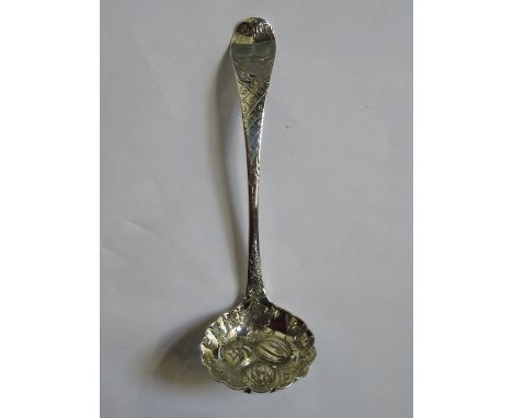 EARLY HALLMARKED SILVER TEA STRAINING LADLE WITH REPOUSSE FRUIT AND VINE DECORATION, MARKS WORN 