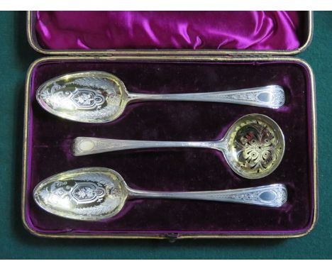 CASED PAIR OF EARLY HALLMARKED SILVER DECORATIVE SPOONS WITH MATCHING STRAINING LADLE, LONDON ASSAY 