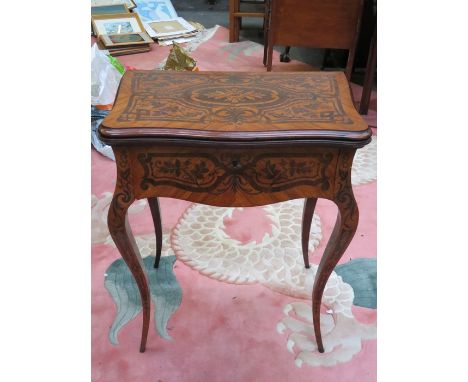 ANTIQUE DUTCH STYLE MARQUETRY INLAID FOLD OVER CARD TABLE WITH SINGLE DRAWER AND FELT LINED INTERIOR 