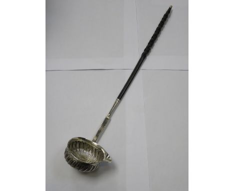 UNHALLMARKED SILVER PUNCH LADLE WITH EBONISED HANDLE, POSSIBLY 18th CENTURY 