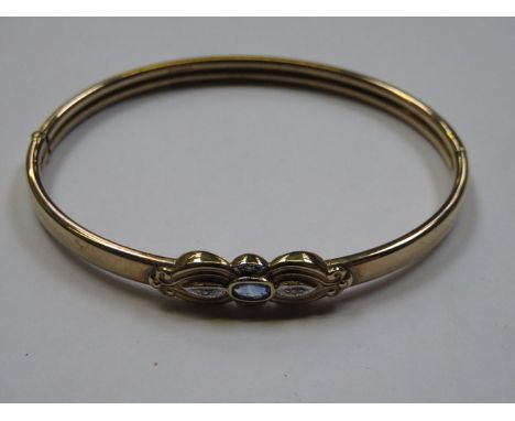 9ct GOLD SNAP BANGLE SET WITH AMETHYST COLOURED STONES 