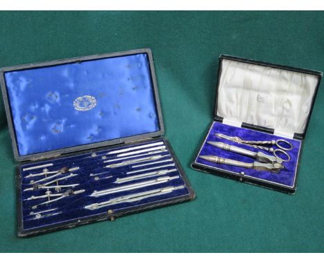 CASED DRAWING INSTRUMENTS AND CASED NUT CRACKER PLUS SCISSOR SET 