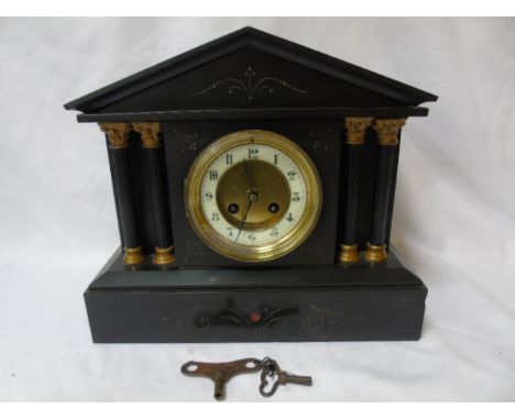 Slate mantle clock with column decoration
