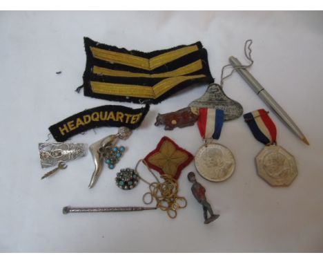 A collection of vintage military items