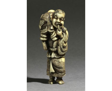 Signed Chuzan on the back. In carved and inlaid elephant tusk portraying a standing father, holding his son who rests over hi