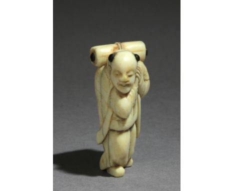 Not signed. In carved horn and elephant tusk portraying a standing Karako carrying a scroll over his shoulders, 52,1x25,9x24 