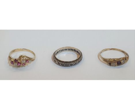 3 9ct gold rings to include an eternity ring with clear stones, a Garnet and diamond ring and a pretty Ruby and diamond examp