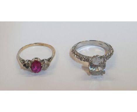 14 ct white gold & CZ solitaire (3.5 grams gross) together with a 9ct yellow gold ring with a central Ruby and a clear stone 