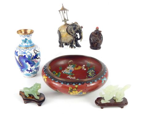 A cloisonné vase and bowl, a carved jade tiger and dragon, a carved horn snuff bottle and a carved ebony Indian elephant clad
